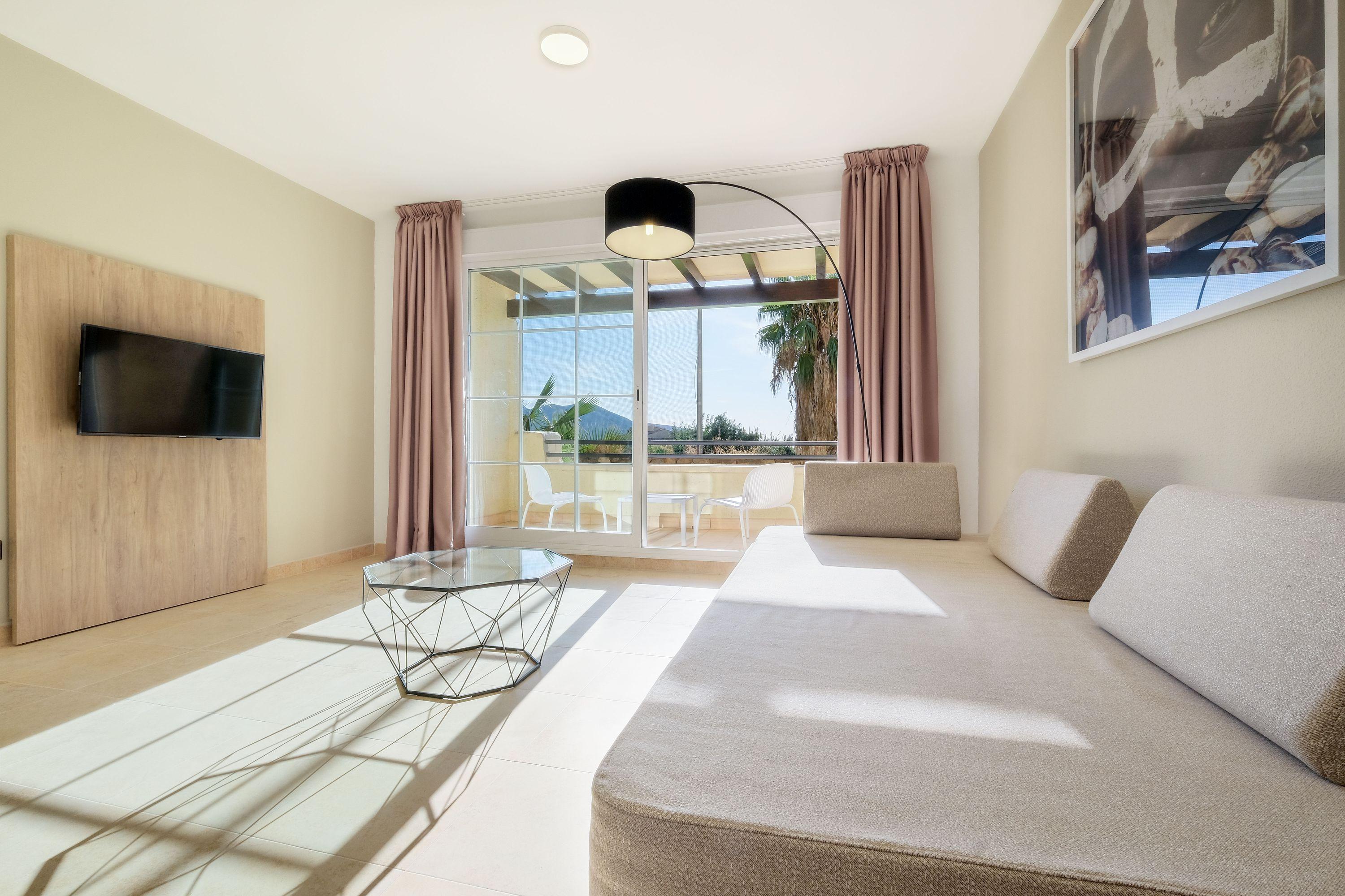 Hotel Envia Almeria Spa & Golf Агвадульсе Экстерьер фото A living room in a hotel